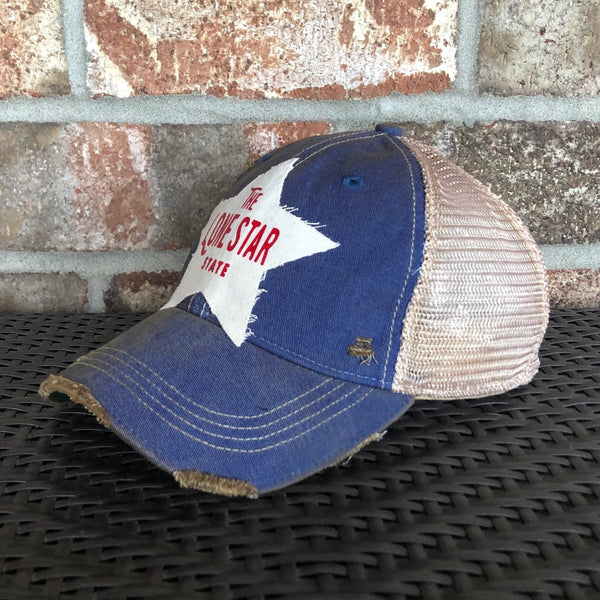 Right side view Lone Star State hat by BohoGroove with red Lone Star State lettering on white star-shaped patch and royal blue vintage distressed snapback