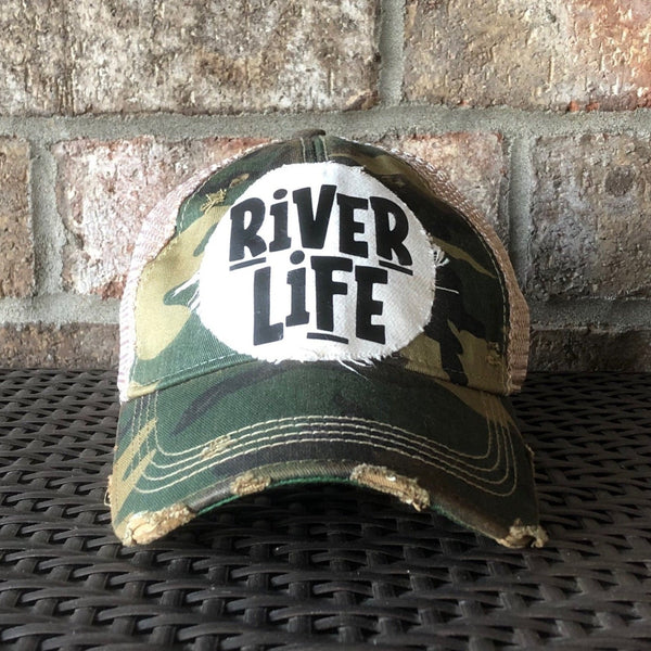 River Life hat by BohoGroove featuring distressed off-white patch with River Life lettering on a camo vintage distressed snapback