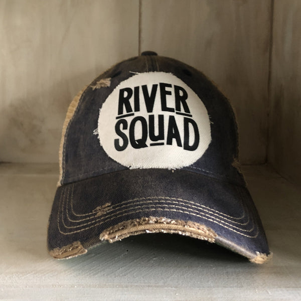 River Squad hat by BohoGroove featuring distressed off-white patch with black River Squad lettering on a navy vintage distressed snapback