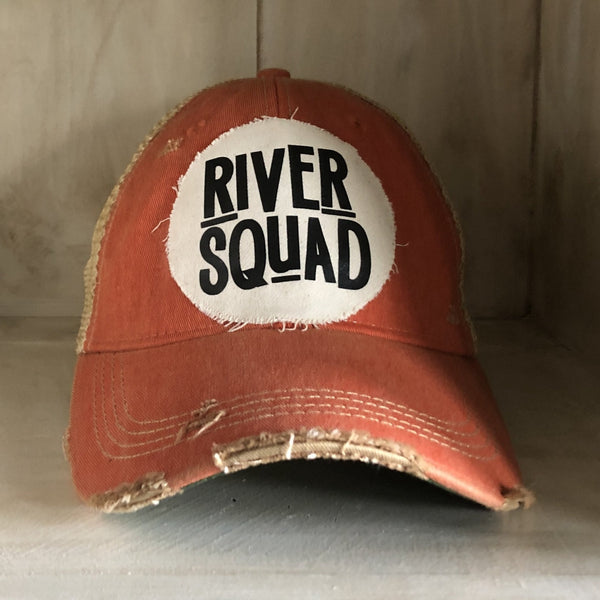 River Squad hat by BohoGroove featuring distressed off-white patch with black River Squad lettering on an orange vintage distressed snapback