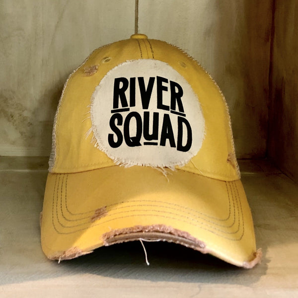 River Squad hat by BohoGroove featuring distressed off-white patch with black River Squad lettering on a yellow vintage distressed snapback