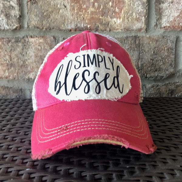 Simply Blessed hat by BohoGroove with black Simply Blessed lettering on a distressed off-white patch on a pink vintage distressed snapback.