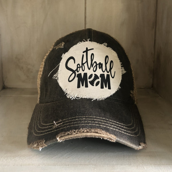Softball Mom hat by BohoGroove featuring black Softball Mom lettering on a black vintage distressed snapback hat