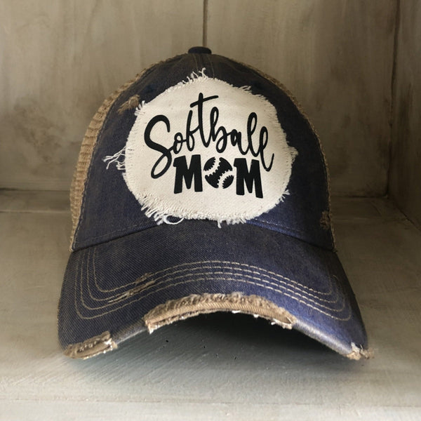 Softball Mom hat by BohoGroove featuring black Softball Mom lettering on a navy blue vintage distressed snapback hat