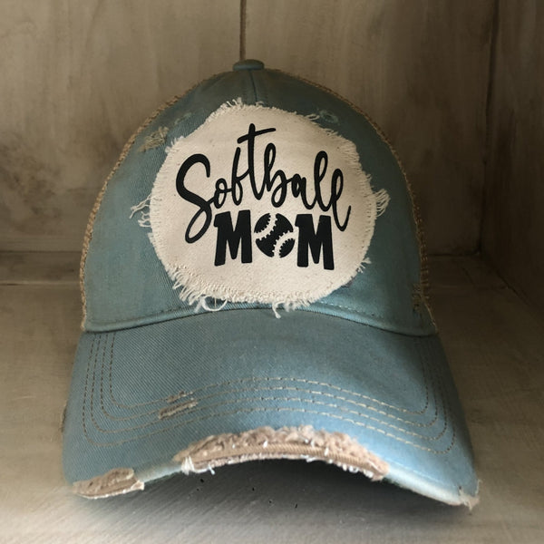 Softball Mom hat by BohoGroove featuring black Softball Mom lettering on an ocean blue vintage distressed snapback hat