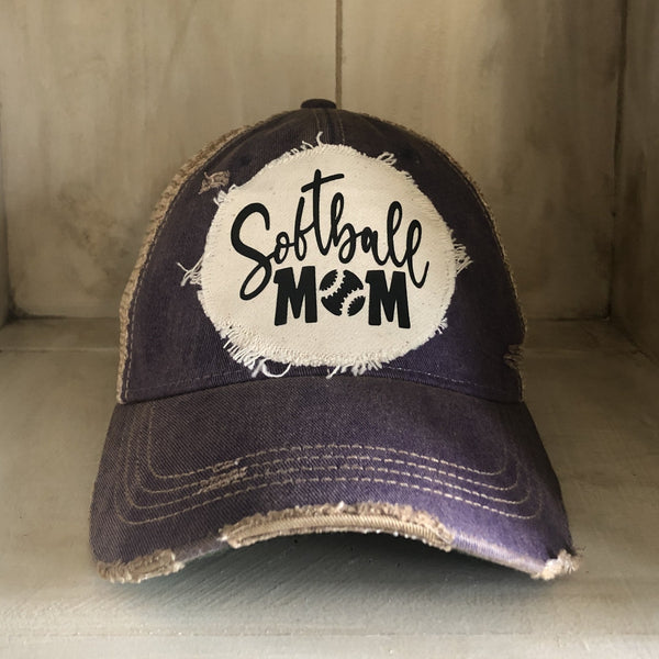 Softball Mom hat by BohoGroove featuring black Softball Mom lettering on a purple vintage distressed snapback hat