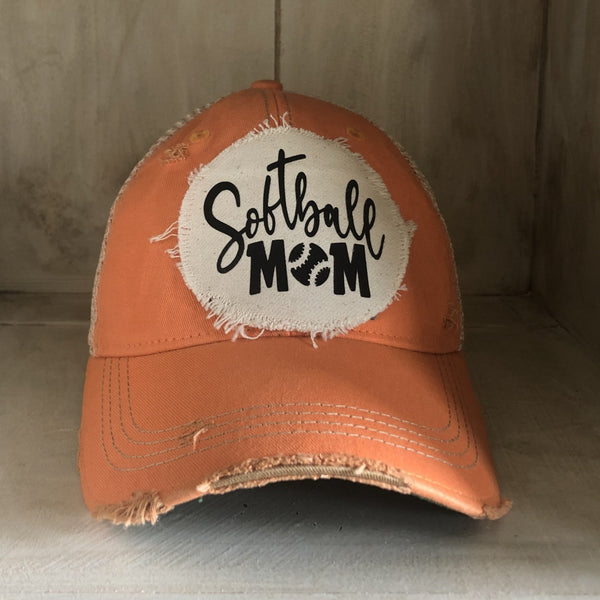 Softball Mom hat by BohoGroove featuring black Softball Mom lettering on a sherbet vintage distressed snapback hat