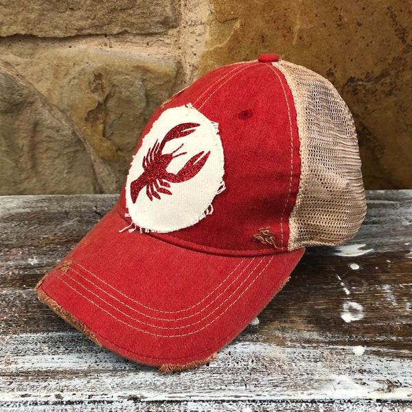Right side view of the Sparkly Crawfish hat by BohoGroove featuring a red glitter crawfish graphic on a distressed off-white patch on a red vintage distressed snapback.