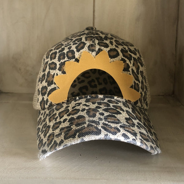 Sunflower hat by BohoGroove featuring yellow sunflower petals and a leopard center on a leopard vintage distressed snapback.