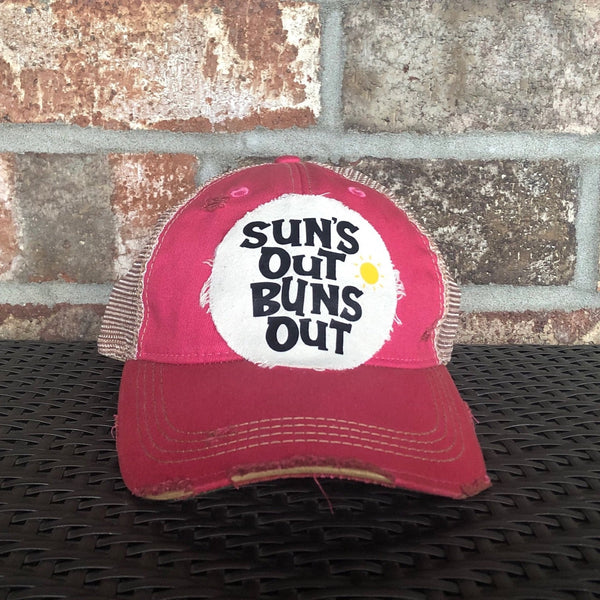 Suns Out Buns Out hat by BohoGroove with black lettering and yellow sun graphic on distressed off-white patch on pink vintage distressed snapback.