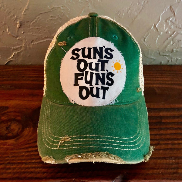 Sun's Out Fun's Out hat by BohoGroove with black Sun's Out Fun's Out lettering and yellow sun graphic on distressed off-white patch on a green vintage distressed snapback.