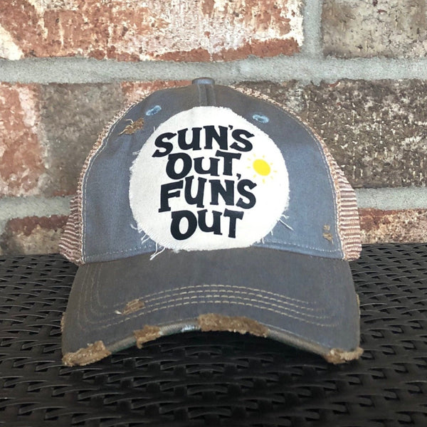 Sun's Out Fun's Out hat by BohoGroove with black Sun's Out Fun's Out lettering and yellow sun graphic on distressed off-white patch on a light blue vintage distressed snapback.