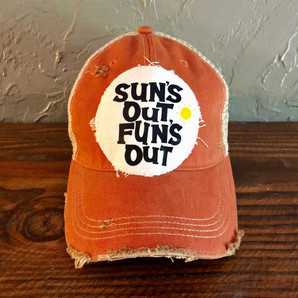Sun's Out Fun's Out hat by BohoGroove with black Sun's Out Fun's Out lettering and yellow sun graphic on distressed off-white patch on an orange vintage distressed snapback.