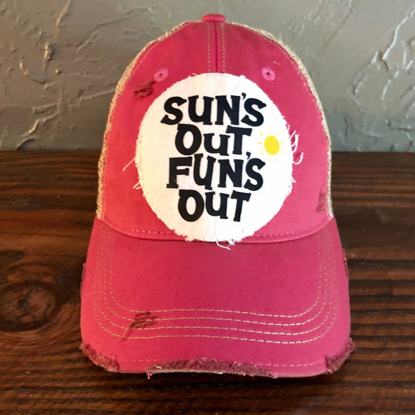 Sun's Out Fun's Out hat by BohoGroove with black Sun's Out Fun's Out lettering and yellow sun graphic on distressed off-white patch on a pink vintage distressed snapback.