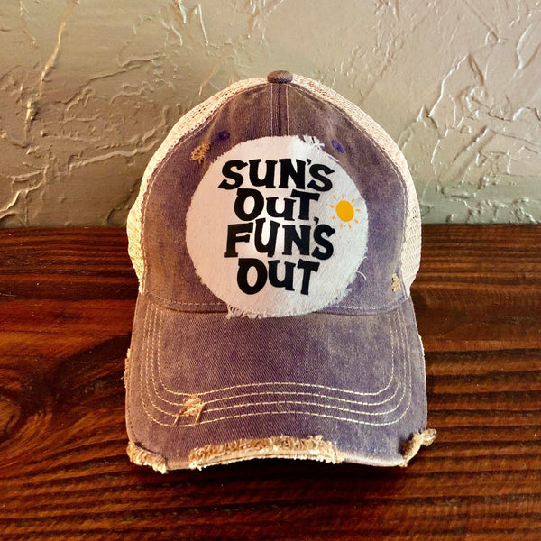 Sun's Out Fun's Out hat by BohoGroove with black Sun's Out Fun's Out lettering and yellow sun graphic on distressed off-white patch on a purple vintage distressed snapback.