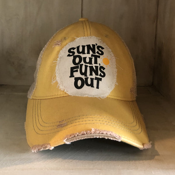 Sun's Out Fun's Out hat by BohoGroove with black Sun's Out Fun's Out lettering and yellow sun graphic on distressed off-white patch on a yellow vintage distressed snapback.
