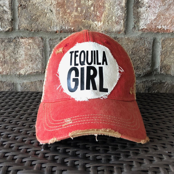 Tequila Girl hat by BohoGroove with black Tequila Girl lettering on a distressed off-white patch on a red vintage distressed snapback trucker hat.