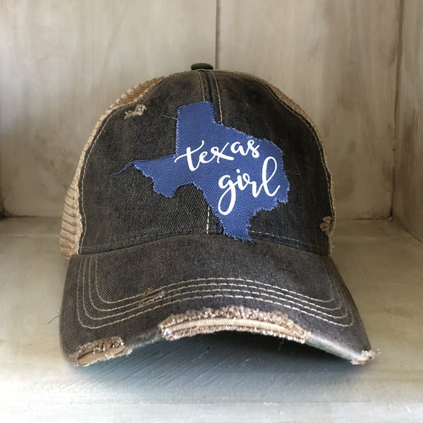 Texas Girl hat by BohoGroove with white Texas Girl lettering on blue Texas-shaped patch and black vintage distressed snapback