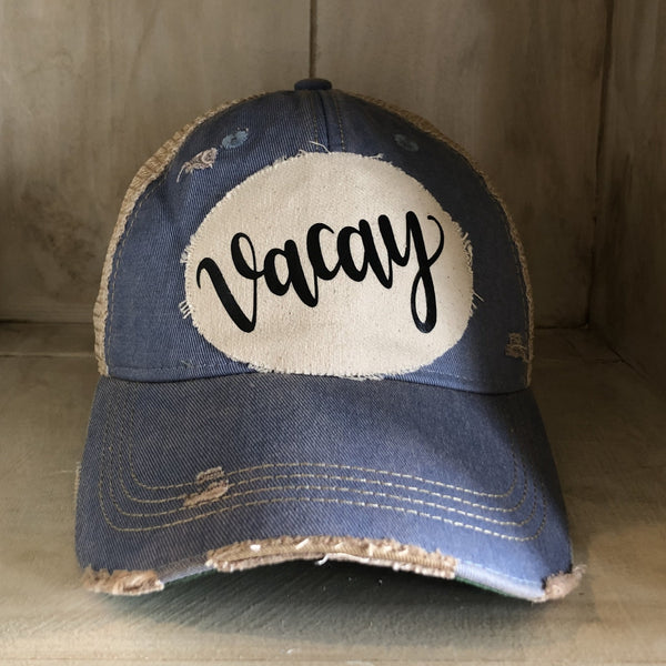Vacay hat by BohoGroove with black Vacay lettering on distressed off-white patch and light blue vintage distressed snapback