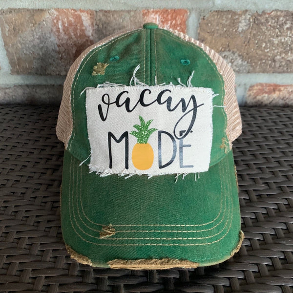 Vacay Mode hat by BohoGroove with black Vacay Mode lettering and pineapple graphic on distressed off-white patch and green vintage distressed snapback