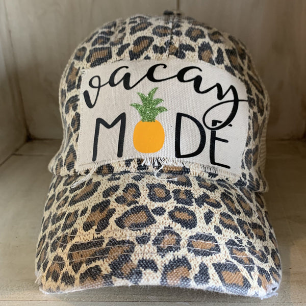 Vacay Mode hat by BohoGroove with black Vacay Mode lettering and pineapple graphic on distressed off-white patch and leopard vintage distressed snapback
