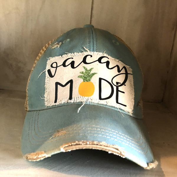 Vacay Mode hat by BohoGroove with black Vacay Mode lettering and pineapple graphic on distressed off-white patch and light blue vintage distressed snapback