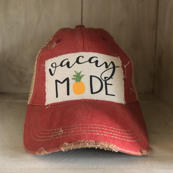 Vacay Mode hat by BohoGroove with black Vacay Mode lettering and pineapple graphic on distressed off-white patch and red vintage distressed snapback