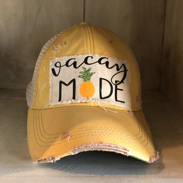 Vacay Mode hat by BohoGroove with black Vacay Mode lettering and pineapple graphic on distressed off-white patch and yellow vintage distressed snapback