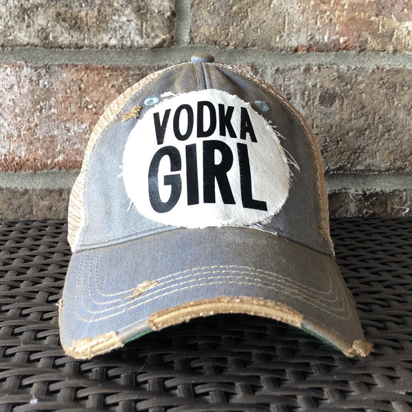 Vodka Girl hat by BohoGroove with black Vodka Girl lettering on a distressed off-white patch on a light blue vintage distressed snapback trucker hat.