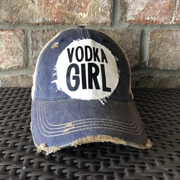 Vodka Girl hat by BohoGroove with black Vodka Girl lettering on a distressed off-white patch on a navy blue vintage distressed snapback trucker hat.