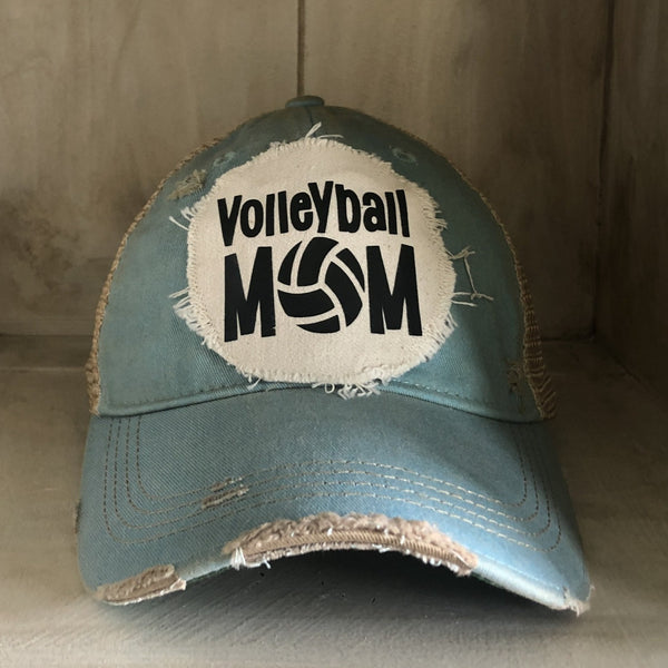 Volleyball Mom hat by BohoGroove featuring black Volleyball Mom lettering on an ocean blue vintage distressed snapback hat