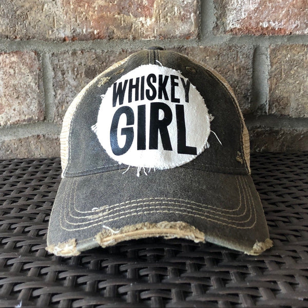 Whiskey Girl hat by BohoGroove with black lettering on a distressed off-white patch on a black vintage distressed snapback.