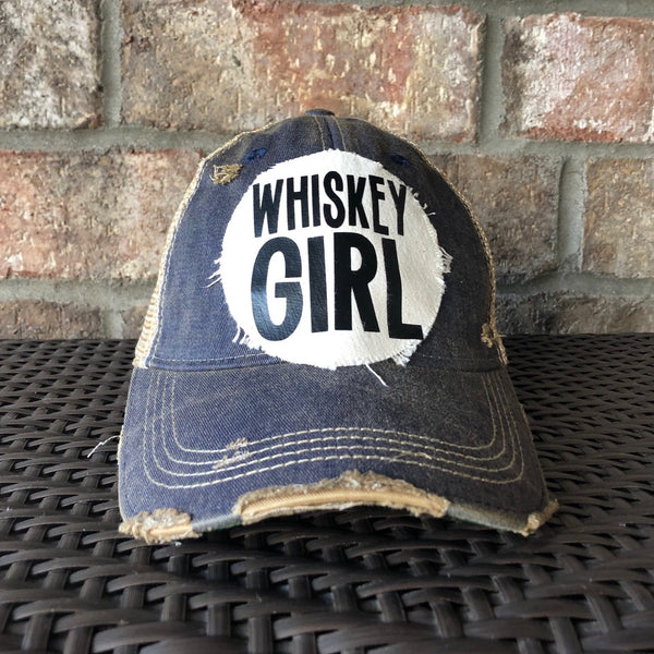Whiskey Girl hat by BohoGroove with black lettering on a distressed off-white patch on a navy blue vintage distressed snapback.
