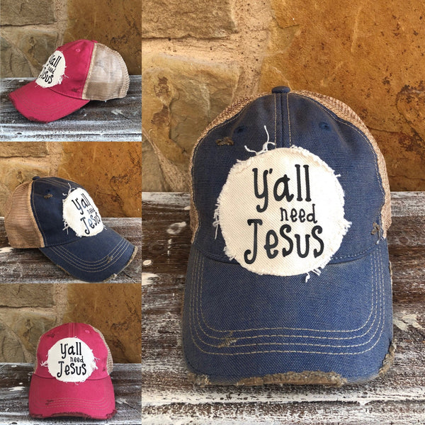 Collage featuring BohoGroove Y’all Need Jesus Hats displayed on navy blue and pink vintage distressed snapback hats. The distressed off-white patch features black Y’all Need Jesus lettering, highlighting the playful faith-inspired design and vintage worn-in style.