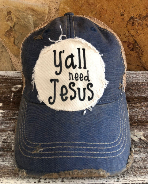 Y’all Need Jesus Hat by BohoGroove with black Y’all Need Jesus lettering on distressed off-white patch on a royal blue vintage distressed snapback